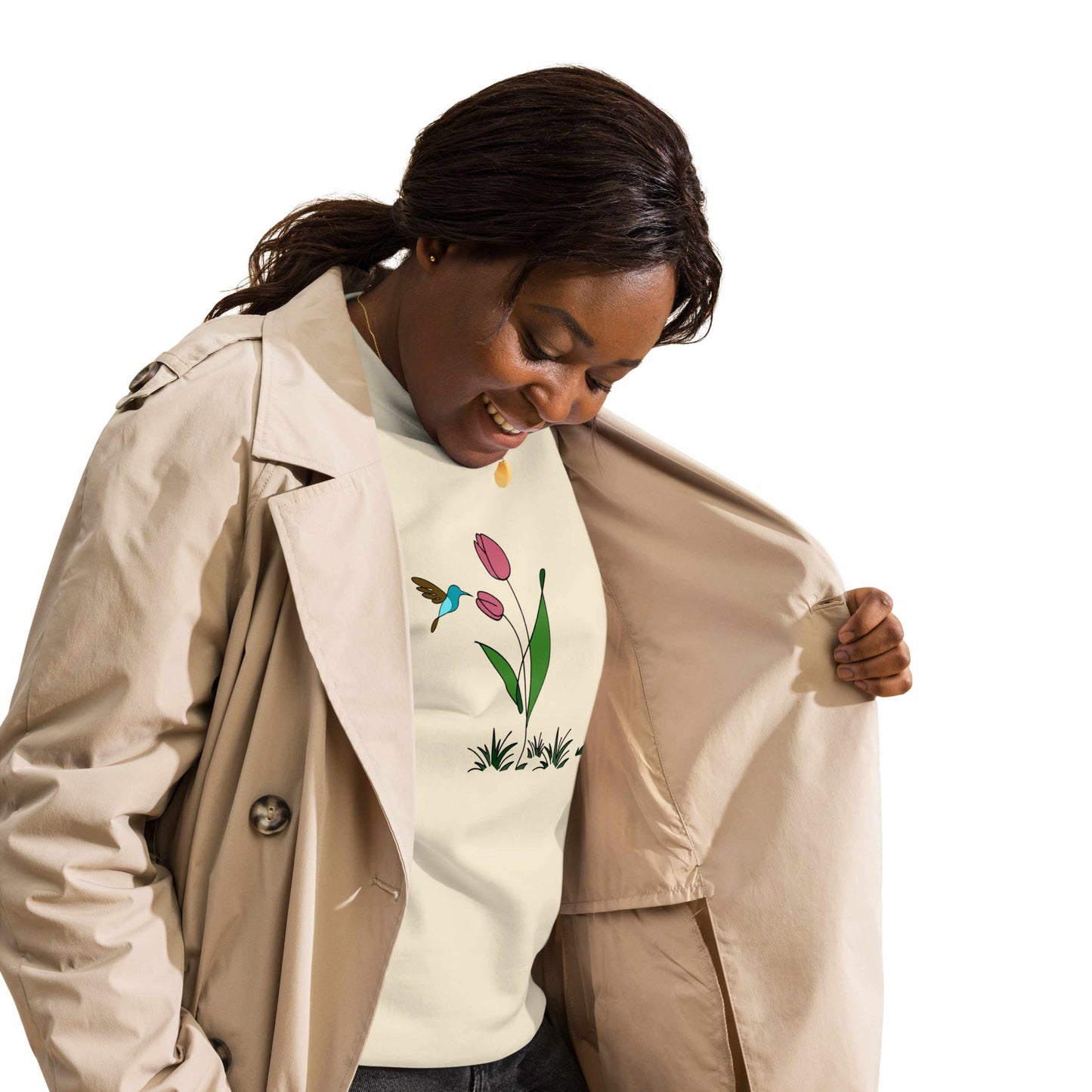 Fresh Feeling design captures a fleeting moment of harmony. Woman wearing sweatshirt with a floral, hummingbird and tulip design.