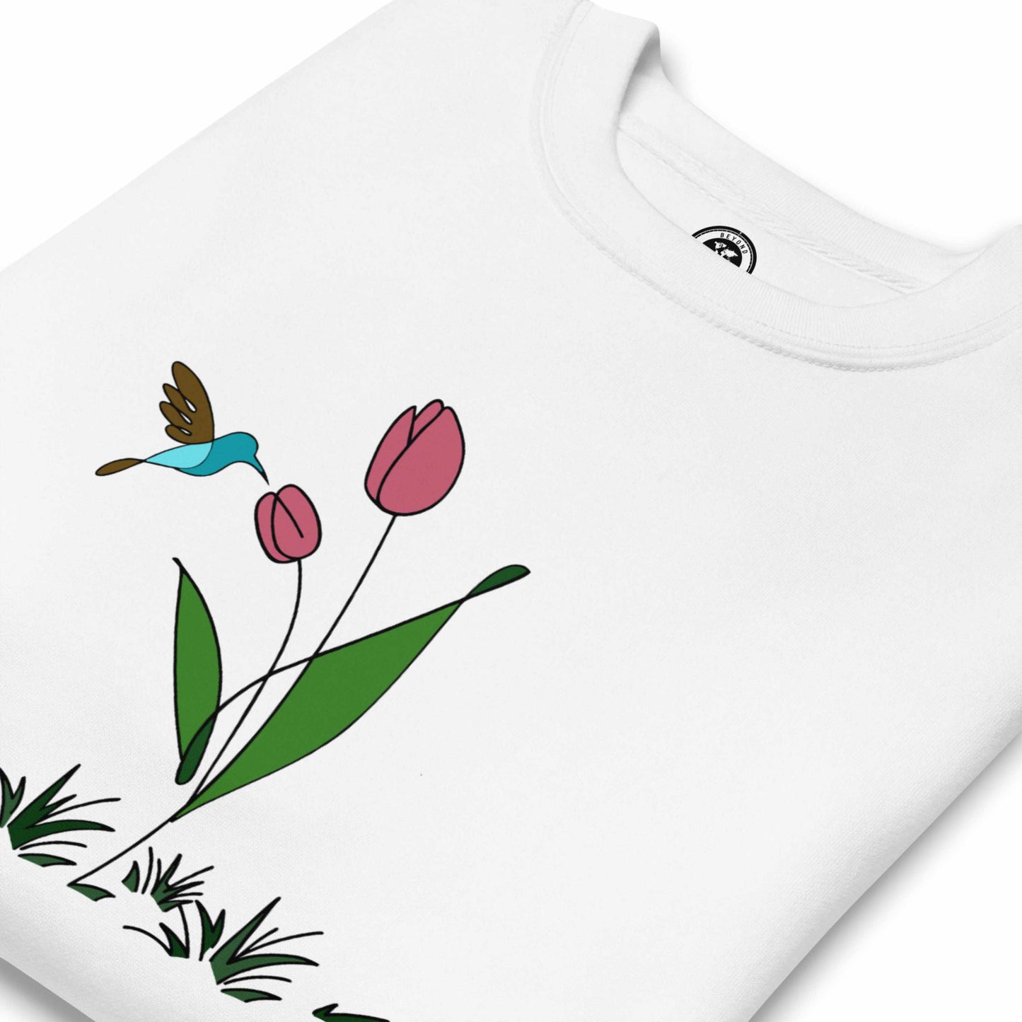 Fresh Feeling design captures a fleeting moment of harmony. White sweatshirt with a floral, hummingbird and tulip design.