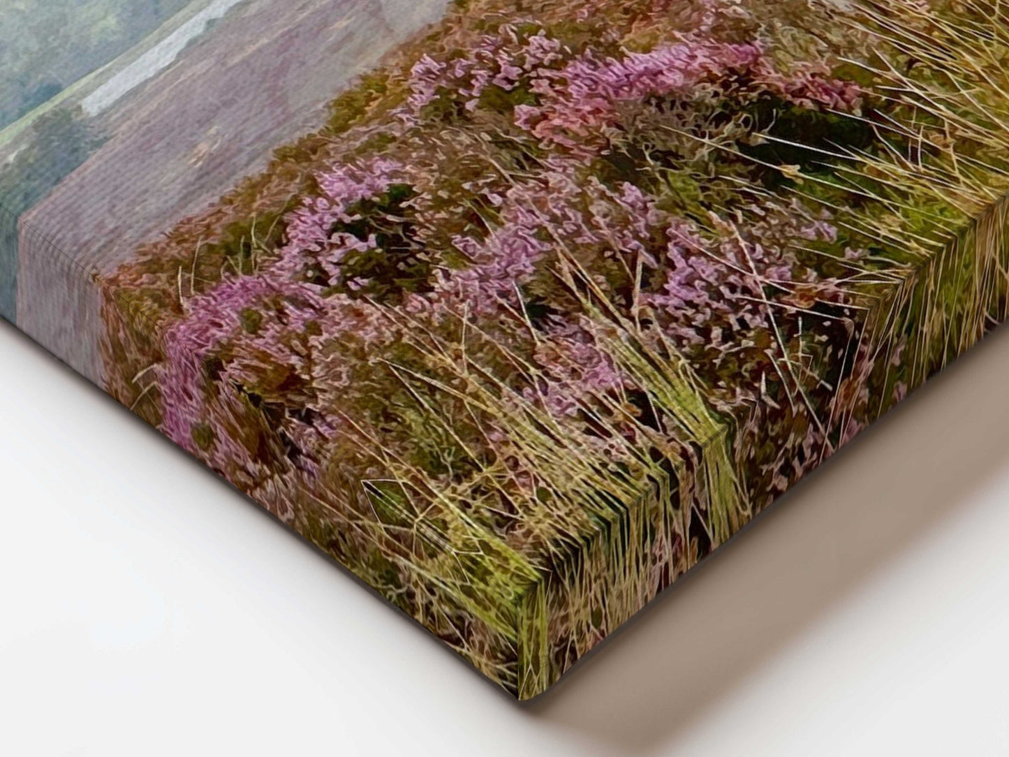 Close-up of a textured surface with pink flowers and greenery