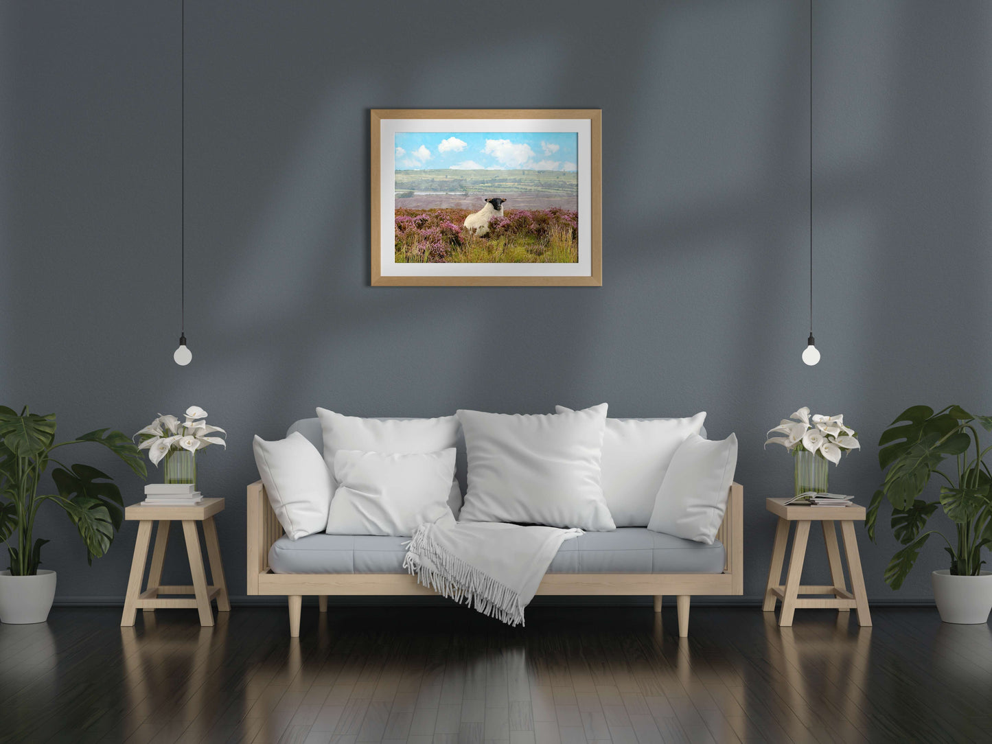 Living room with a framed landscape painting above a sofa.