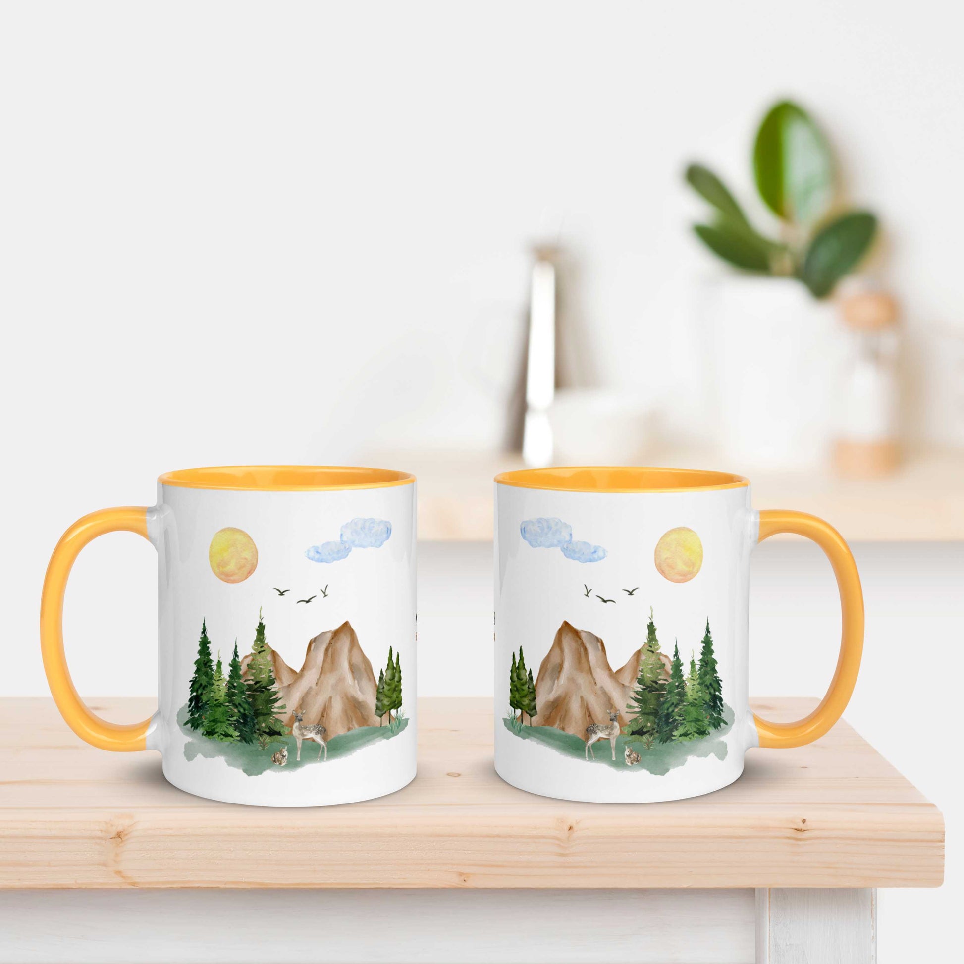 Ceramic Mug featuring a nature scene with trees, mountains, and a deer.