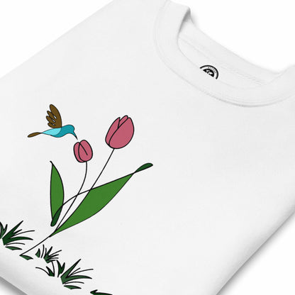 Fresh Feeling design captures a fleeting moment of harmony. White sweatshirt with a floral, hummingbird and tulip design. 