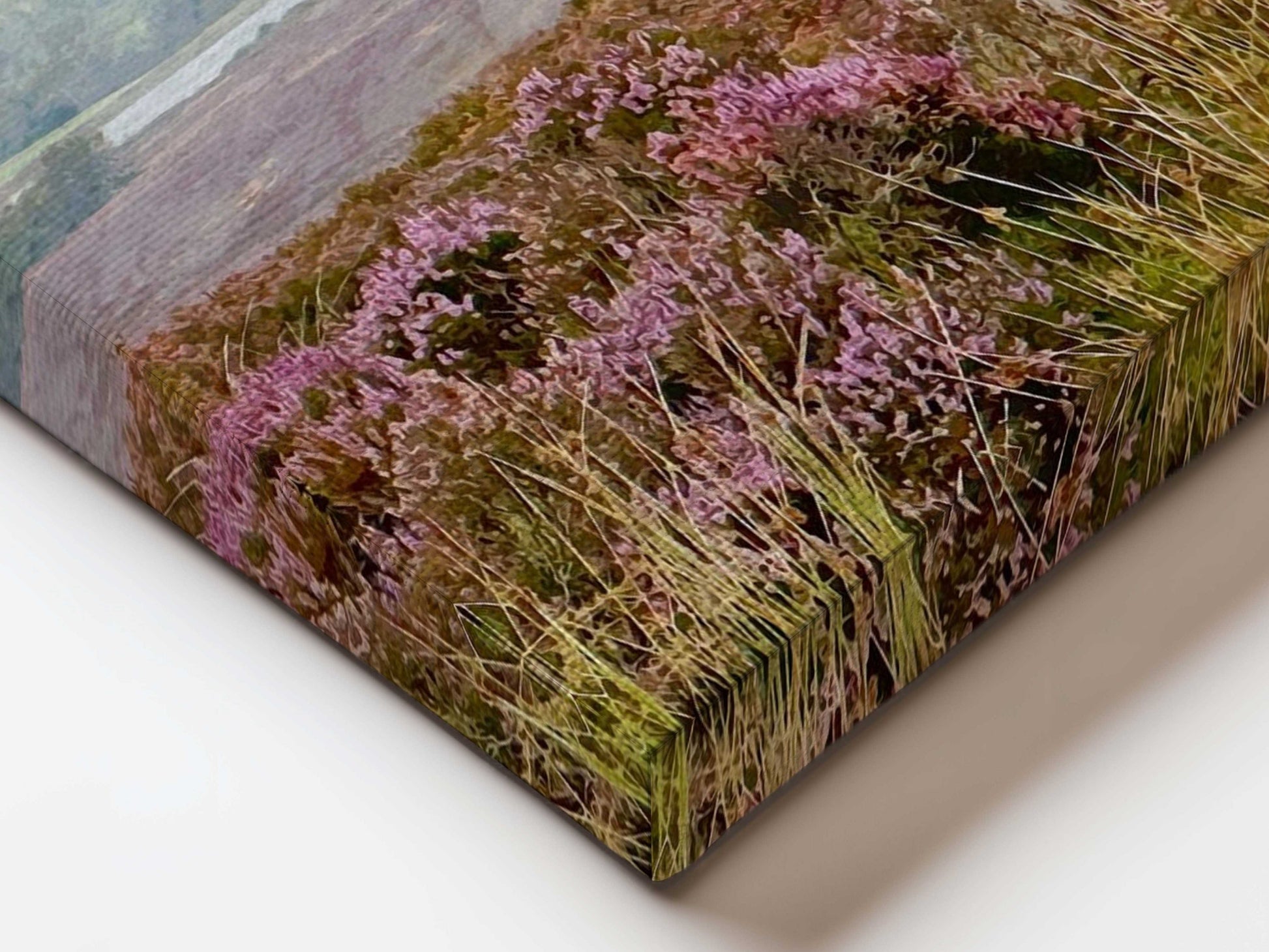 Close-up of a textured surface with pink flowers and greenery