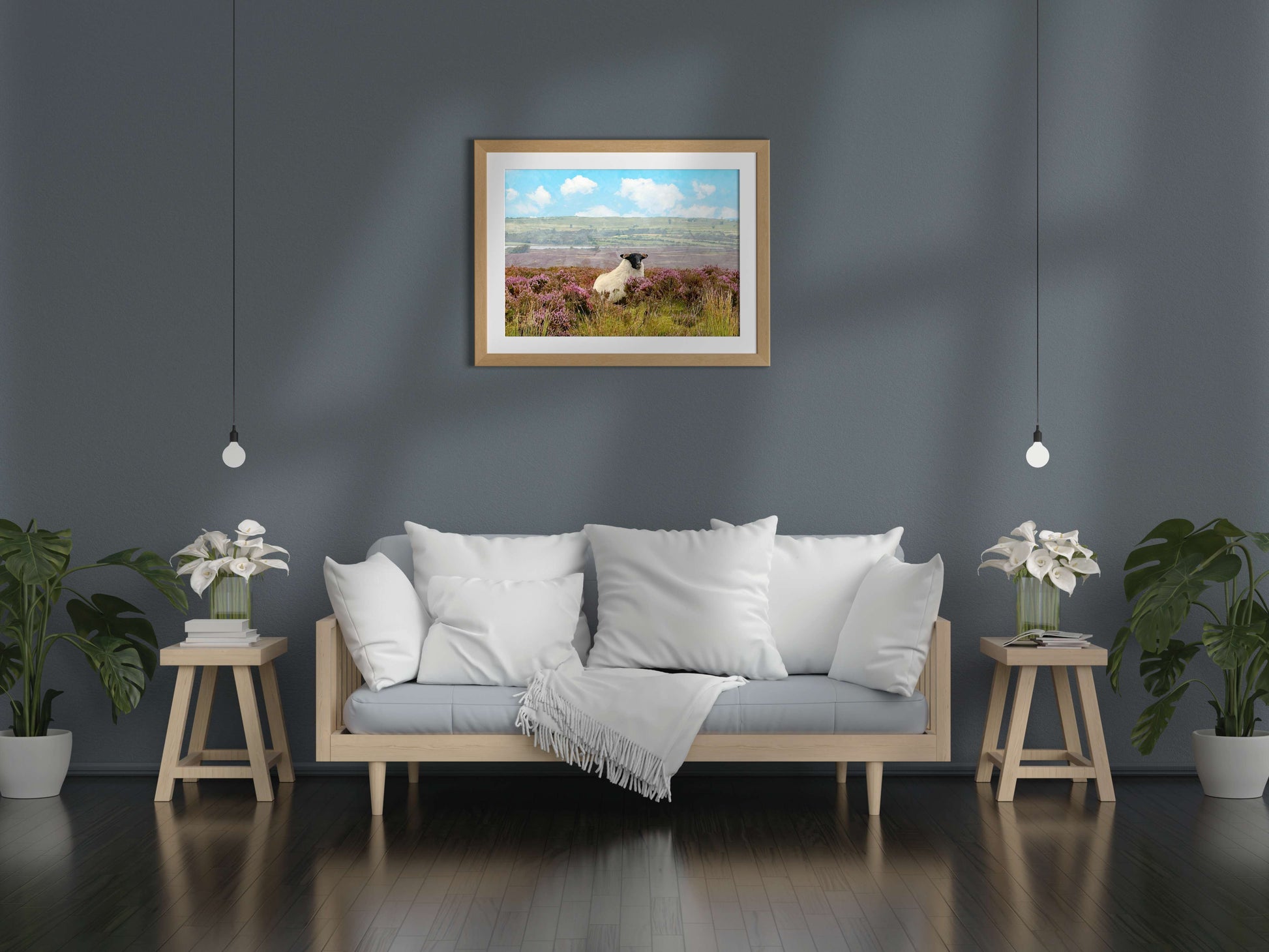 Living room with a framed landscape painting above a sofa.
